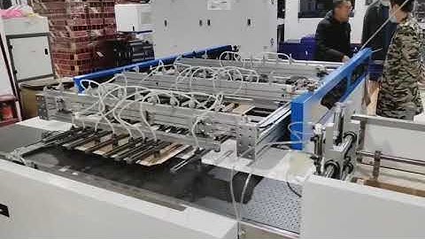 Automatic case maker with new wrapping device: automatic size change, no scratches