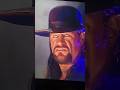 The undertaker rolls eyes back at the audience
