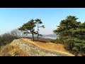 Walk along the mountain path feeling the warm spring, fortress walk, sound of wind and birdsong