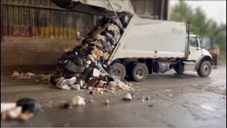 'Unbelievable! Garbage Truck So Loaded  Literally Plops a Brick!'