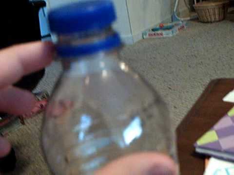 Coin Through Bottle Trick-revealed