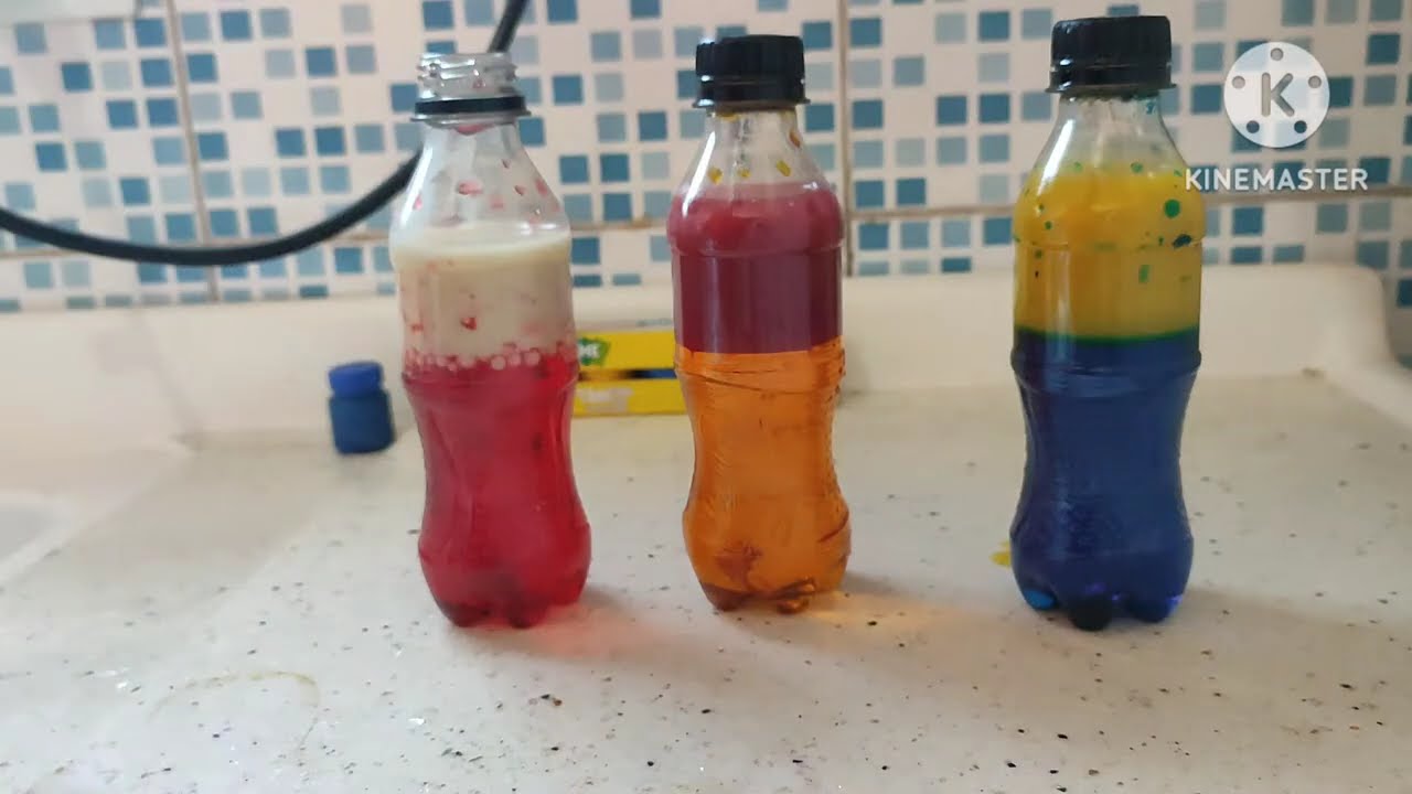 Garrafas sensoriais mistura das cores com água e óleo!