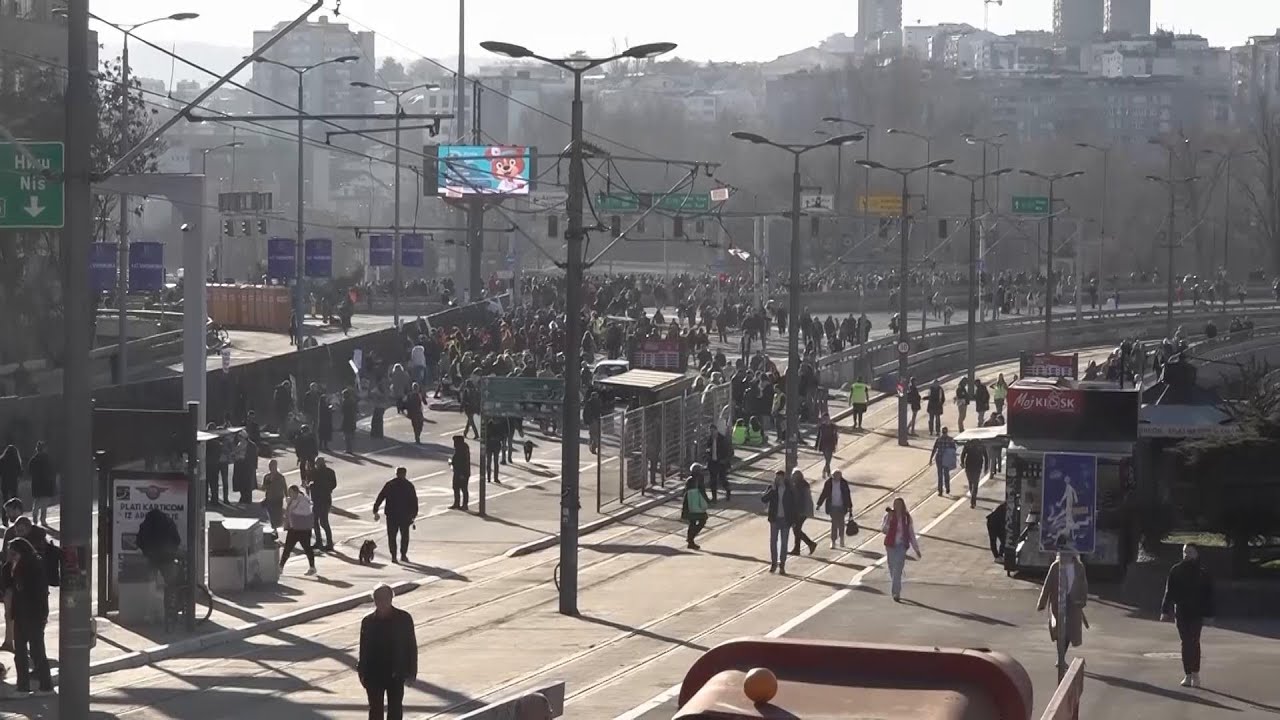 Serbia's striking university students end a 24-hour blockade of intersection in Belgrade