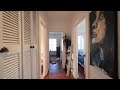 SUNNY CHARACTER, EASY LIVING AT A FASHIONABLE ADDRESS
