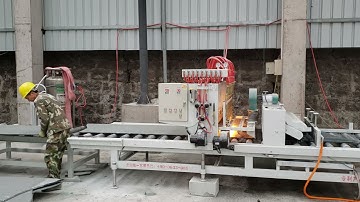 Automatic flaming granite slab machine