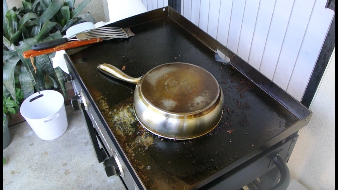 Grilling a whole chicken for shredding on a Blackstone flat top Griddle