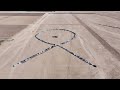 100 vehicles - representing the number of hostages - formed the hostages' symbol at Sde Boker