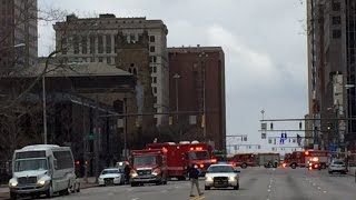 Police reopen streets after suspect leaves suspicious package during bank robbery