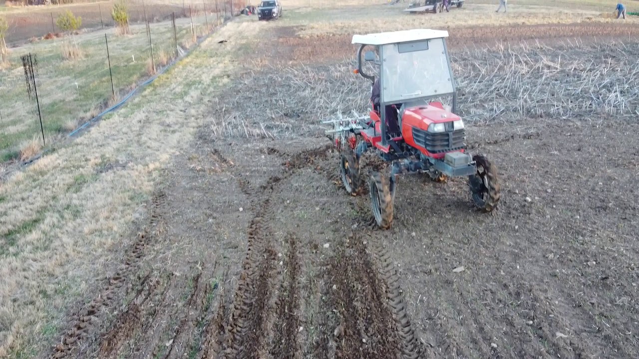 Q-Hoe Weeding Machine 4-Row on Kubota GR16
