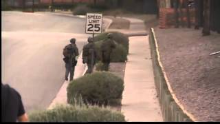 SWAT suspect surrenders peacefully