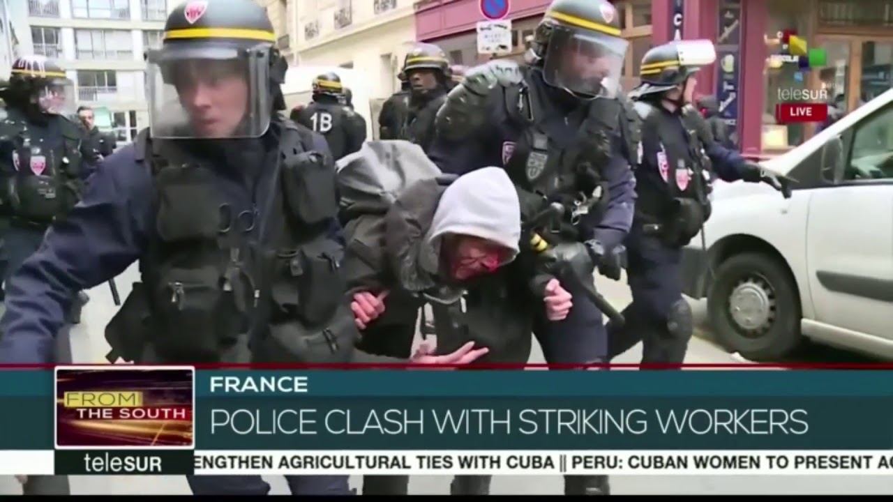 Thousands protest against French President Emmanuel Macron's reforms