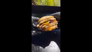 Bacon, Egg &amp; Cheese Breakfast Sausage Smash Biscuit on the Griddle