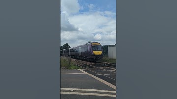 EMR Class 170 (170270) passing Cherry Willingham Crossing