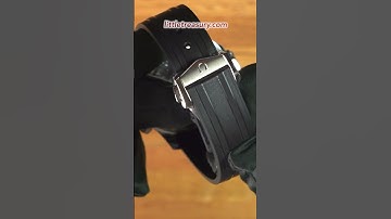 The Rubber Deployant Clasped Strap on the No Date Aluminum Wave Dial Omega Seamaster Diver 300m