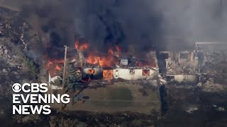 Arizona wildfire destroys homes and forces evacuations