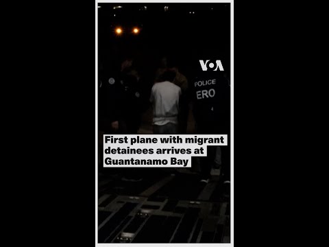 First Plan Of Migrant Detainees From US Arrive At Guantanamo Bay 