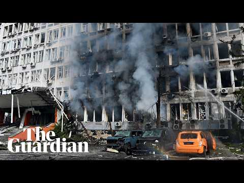 Footage shows people fleeing as drone strikes business centre in Kyiv