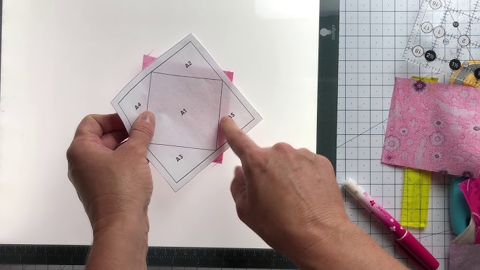 How to Use the Bloc Loc Ruler to Trim Half Square Triangles 