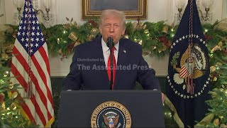 Trump in White House speech announces $1,776 bonus for US troops, as he says economy is strong