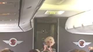 Brenda Lee singing “Rockin’ Around The Christmas Tree” on my flight