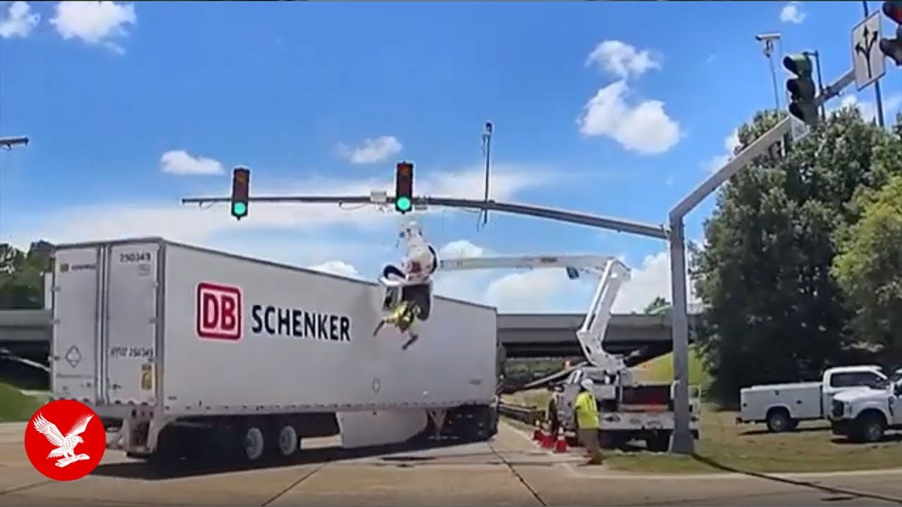 Worker left hanging upside down after truck smashes into cherry picker ...