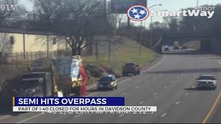 Portion of I-40 reopens after semi strikes overpass