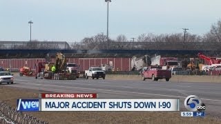 Truck crashes into bridge shutting down I-90