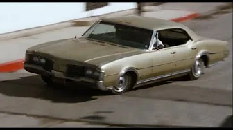 bandits escape in '68 Olds Delmont 88