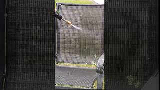 Satisfying power washing a patio chair