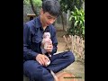 A heartwarming scene! Father feeding a baby monkey with a bottle
