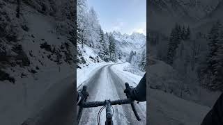 POV Cycling Through a Snowy Alpine Mountain Road 🚴❄️