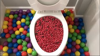 Will It Flush? - Plastic Balls And Red M&Ms