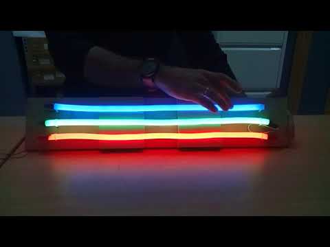Vídeo: A luz de néon produz calor?