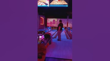 Bowling with string pins