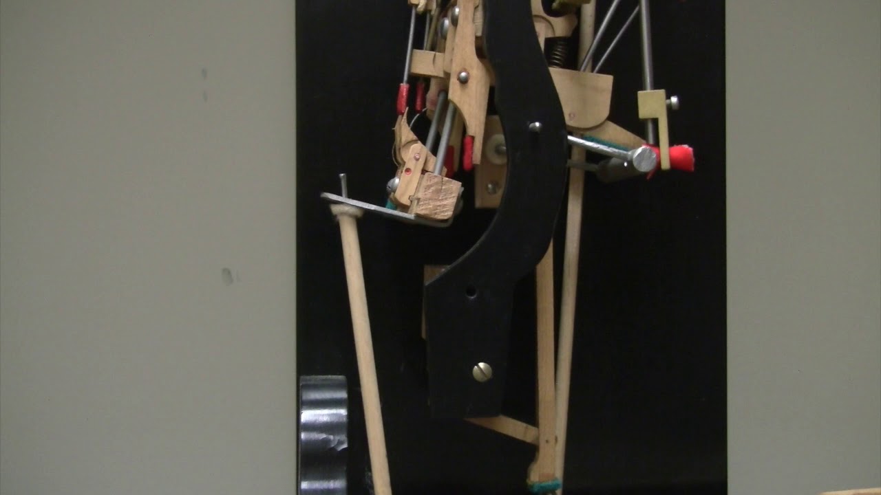 Upright action model with sostenuto, close up of sostenuto mechanism, slow