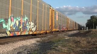 CEFX SD40-2 3155 leads vehicle train Q203 at Longview, Alabama