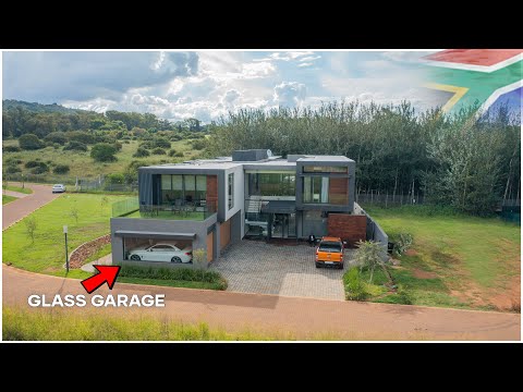 Video: U-formet moderne bolig i Johannesburg Viser ekstravagante egenskaber