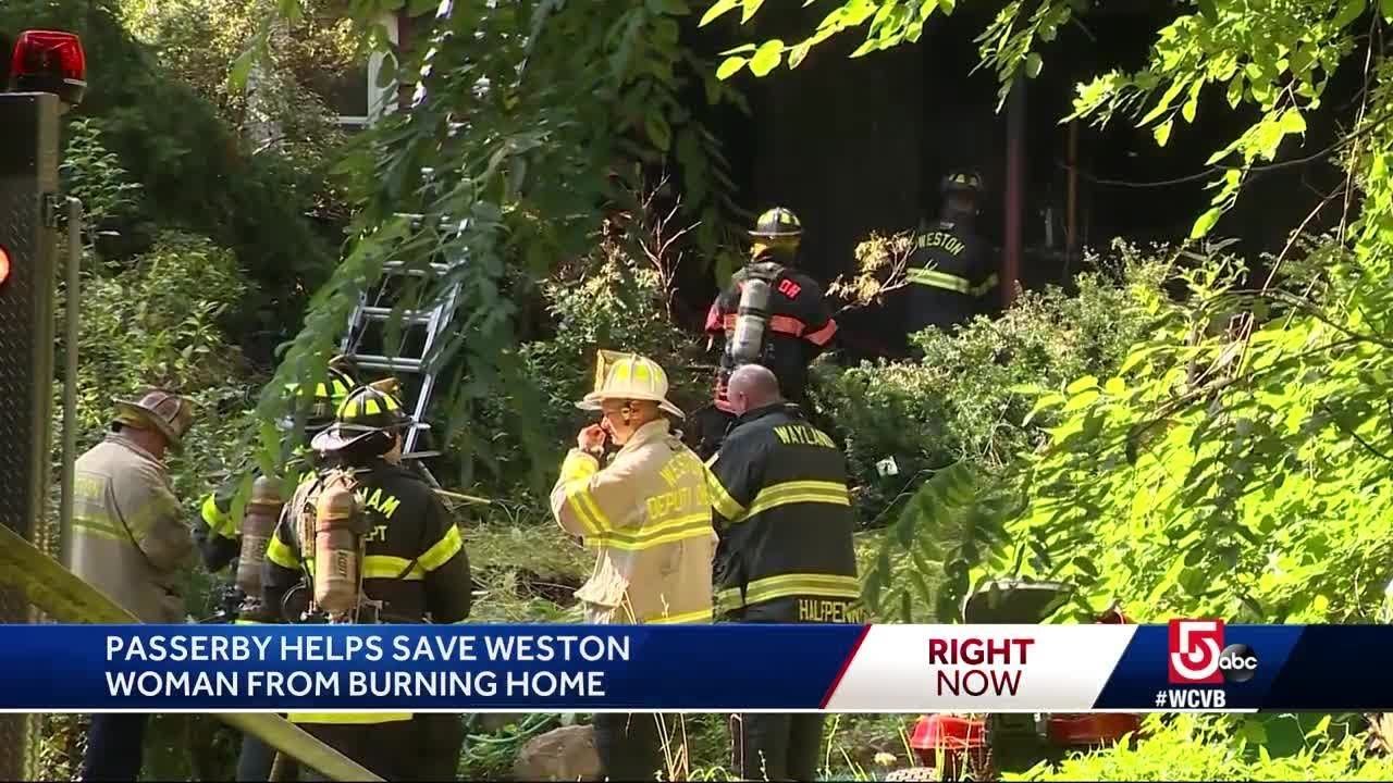 Woman rescued from burning home - YouTube