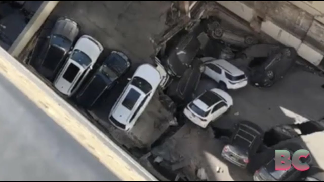 Multiple people trapped after parking garage collapses in NYC - YouTube