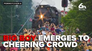 Union Pacific's Big Boy 4014 emerges to a crowd of cheering people in Cresson, Pennsylvania