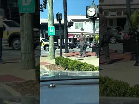Homeless mannequin with a cash app