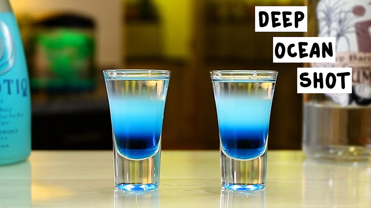 These beautifully layered blue curacao cocktails mix up blue curacao, Hpnot...