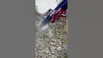 Little drill mast soil nail installation.