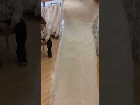 Girl try on dress and falls off naked