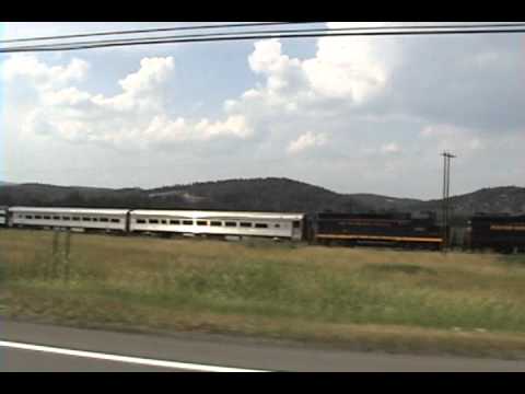 In commemeration of my FOURTH YEAR on YouTube, I've decided to upload my video of the Chase of the All-Day Excursion from West Virginia Rails 2010! The chase took us from Petersburg to Romney, through some wonderful farm land and near the Potomac River. Western Maryland GP30 #501, with South Branch Valley's #100, pulled the train North - B&O F-Unit #722 and GP9 #6404 were on the Southern end for the Photo Runbys. I tried to upload a version I edited in Pinnacle Studio 12, but the file proved to be too large :P... So, here's the Window's Movie Maker version... Hope you enjoy it and KEEP ON STEAMING! -Trainmaster844 (Chris K.)