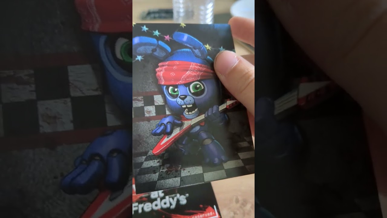 opening FNAF trading cards