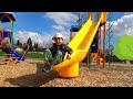 outdoor playground kids fun play day - children playing with park toys