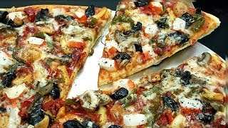 بيتزا ناجحة بعجينة رطبة ، مذاق لا يقاوم Recette de pizza facile