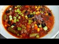 Paulie's Budget Friendly Turkey Chili cooked in a cast-iron Dutch oven