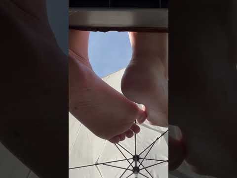 Under sun bed view of soles